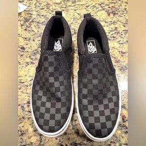 Size 5 black checkered Vans slip ons